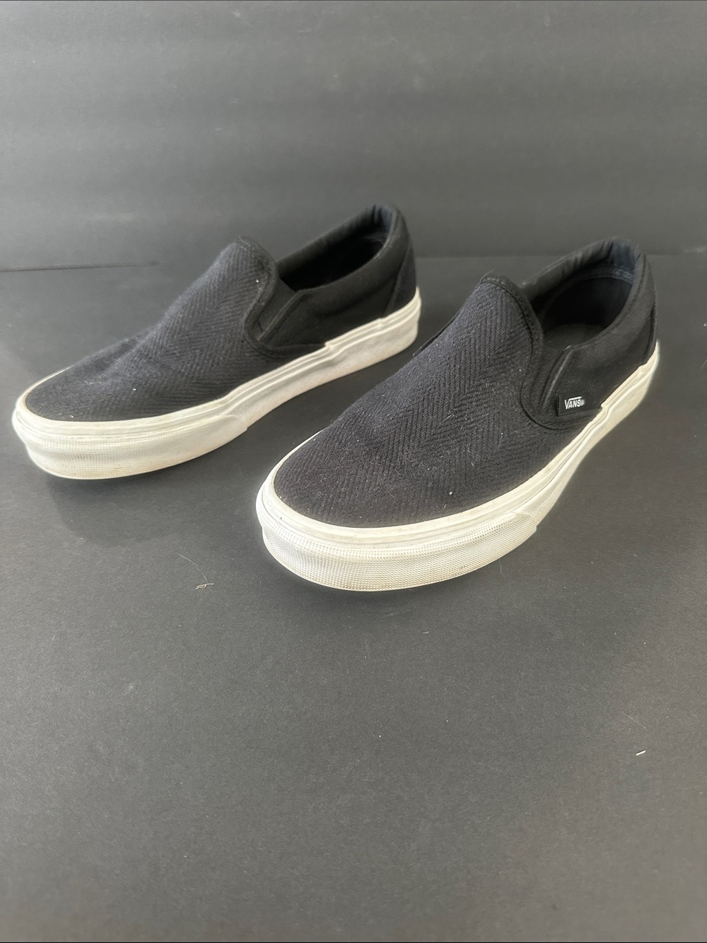 Vans black and white slip on shoes women’s size 7